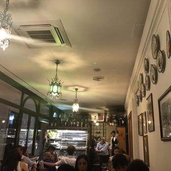 Hostaria Romana - The interior of one side of the first floor dining room. - Italian Near Me - Rome, RM Hostaria Romana - The interior of one side of the first floor dining room. - Italian Near Me - Rome, RM