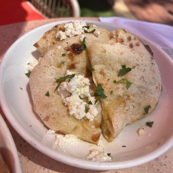 Paradiso - Fresh baked bread with feta and olive oil - Bars Near Me - Dallas, Texas