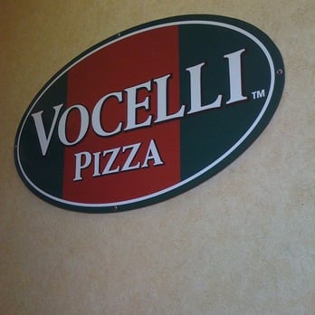 Vocelli Pizza - a sign on the wall of a restaurant - Italian Near Me - Charlottesville, Virginia Vocelli Pizza - a sign on the wall of a restaurant - Italian Near Me - Charlottesville, Virginia