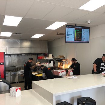 Cluck & Blaze - Making chicken - Chicken Shop Near Me - Long Beach, California