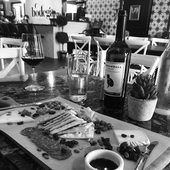 Bodega Wine Dive - a cheese board with a variety of cheeses - Pizza Near Me - Lake Charles, Louisiana