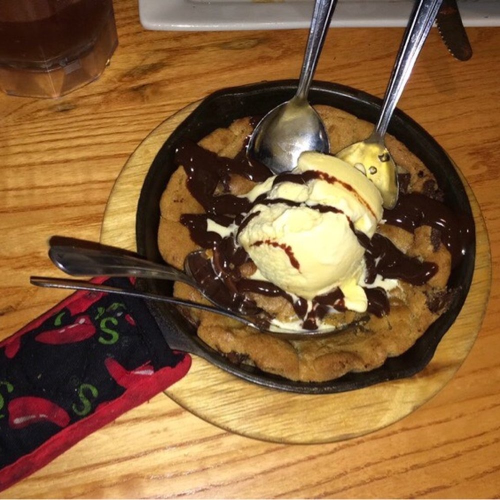 Chili's - Chocolate chip pizookie with vanilla ice cream and chocolate syrup. - Tex-Mex Near Me - Manteca, California Chili's - Chocolate chip pizookie with vanilla ice cream and chocolate syrup. - Tex-Mex Near Me - Manteca, California