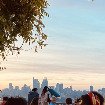 Bok Bar - a group of people sitting at a table with a view of a city - Bars Near Me - Philadelphia, Pennsylvania Bok Bar - a group of people sitting at a table with a view of a city - Bars Near Me - Philadelphia, Pennsylvania
