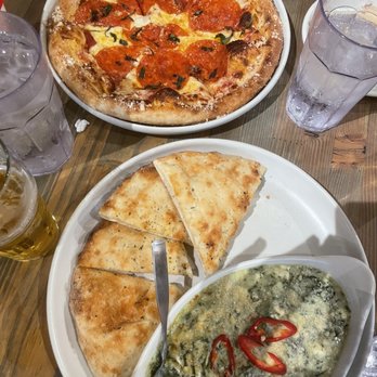 Barnyard Crafthouse & Eatery - Custom made Pepperoni basil pizza and Spinach Dip - New American Near Me - Tucson, Arizona Barnyard Crafthouse & Eatery - Custom made Pepperoni basil pizza and Spinach Dip - New American Near Me - Tucson, Arizona