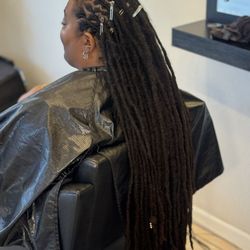J D's Hair Studio - JD is the best!!! He's been doing my locs for over 10 years Nice shop and he has a personality that makes you want to keep coming!!!