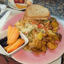 The Red Barn Farm - Sausage egg scramble with fruit cup, toast, potatoes, and coffee with biscotti