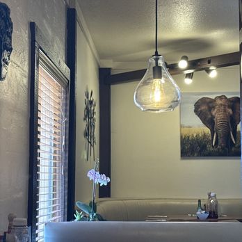 Hidden Cuisine - African inspired art work adorns the walls of the very comfortable dining room. - Breakfast & Brunch Near Me - Moab, Utah