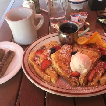 Palacio Cafe - French toast with a side of sausage and a coffee - Sandwiches Near Me - Santa Fe, New Mexico Palacio Cafe - French toast with a side of sausage and a coffee - Sandwiches Near Me - Santa Fe, New Mexico