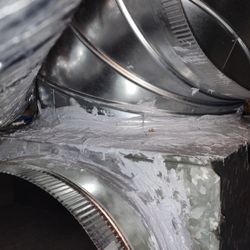 Alpine Air - In the process of getting sealant. New ducting....