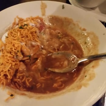 Caraway - Papdi chaat is absolutely drenched in tamarind sauce. It looks more like cereal than anything else! - Indian Near Me - Ilford, XGL Caraway - Papdi chaat is absolutely drenched in tamarind sauce. It looks more like cereal than anything else! - Indian Near Me - Ilford, XGL