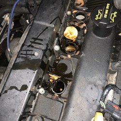 Billy's Auto Repair - THERE SHOULD NEVER BE OIL LIKE THAT, TWO SPARK PLUGS AND THE COIL BOOT WERE SOAKED IN OIL WHEN I MYSELF TOOK A LOOK.