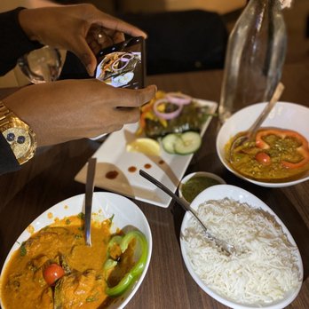 Chimney Indian Kitchen + Bar - Ragada Patti Tandoori Shrimp Banana Leaf Fish Garlic Bread - Indian Near Me - Chapel Hill, North Carolina Chimney Indian Kitchen + Bar - Ragada Patti Tandoori Shrimp Banana Leaf Fish Garlic Bread - Indian Near Me - Chapel Hill, North Carolina