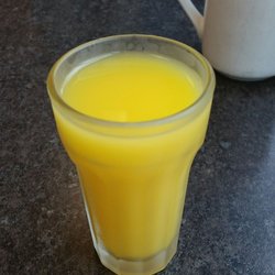 Ralph & Sons Diner - Orange juice in a cute glass! Comes with the breakfast specials!