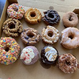 a variety of donuts in a box