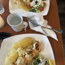 Lamb dish and prawn & scallop dish Souvlaki Lamb dish and prawn & scallop dish Souvlaki