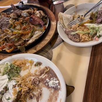 La Palma Mexican Grill - We had combination fajitas for 2, which included beans, rice, steak, scallops, shrimp, chicken, pork with all of the "fixins" it was great! - Mexican Near Me - Leesburg, Florida La Palma Mexican Grill - We had combination fajitas for 2, which included beans, rice, steak, scallops, shrimp, chicken, pork with all of the "fixins" it was great! - Mexican Near Me - Leesburg, Florida