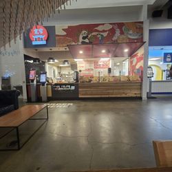 Foodstall in the middle by the stairs