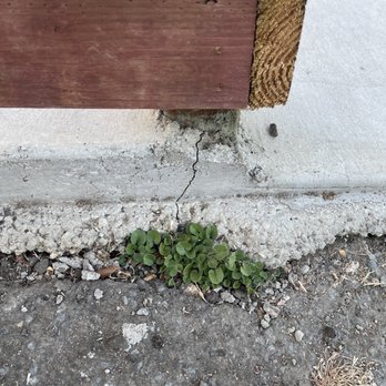 AAA Builders - Cracked cement, remnants of cement not cleaned up before drying. Extremely sloppy. - General Contractors Near Me