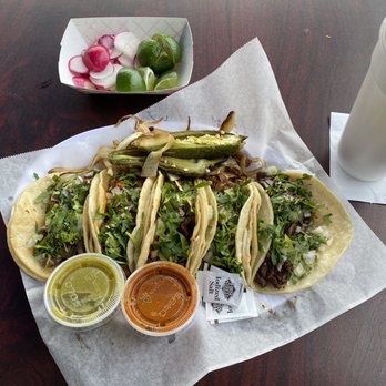 El Charro Taqueria - TACOS: from left to right - lengua, adobada x2, carnitas, carne asada - Tacos Near Me - Mammoth Lakes, California