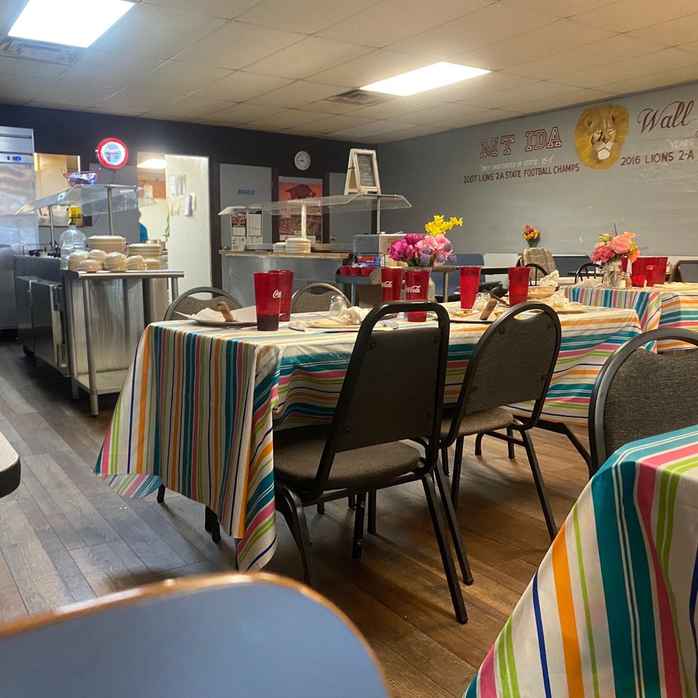 Shack Attack Pizza - tables and chairs with colorful tablecloths - Pizza Near Me - Mount Ida, Arkansas Shack Attack Pizza - tables and chairs with colorful tablecloths - Pizza Near Me - Mount Ida, Arkansas
