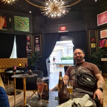 Liam's Den & Bubble Bar - My son in law enjoying our post show stop - Champagne Bars Near Me - Las Vegas, Nevada Liam's Den & Bubble Bar - My son in law enjoying our post show stop - Champagne Bars Near Me - Las Vegas, Nevada