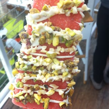 Popbar - White chocolate drizzle with pistachio and almond bits - Desserts Near Me - Anaheim, California Popbar - White chocolate drizzle with pistachio and almond bits - Desserts Near Me - Anaheim, California