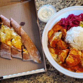 Anatolia's Gate Restaurant - Left: Meat Lover's Pide; Right: Chicken Iskender - Halal Near Me - Burnaby, British Columbia Anatolia's Gate Restaurant - Left: Meat Lover's Pide; Right: Chicken Iskender - Halal Near Me - Burnaby, British Columbia