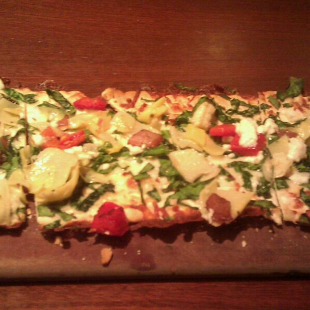 Seasons 52 - Artichoke & goat cheese flatbread // spinach // balsamic onions // roasted peppers - New American Near Me - Schaumburg, Illinois Seasons 52 - Artichoke & goat cheese flatbread // spinach // balsamic onions // roasted peppers - New American Near Me - Schaumburg, Illinois