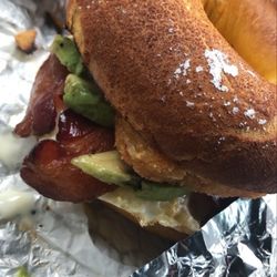 Bagel House - Bacon Egg and Cheese on a French Toast Bagel with A Hash brown and Avacado