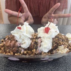 Braums Ice Cream & Dairy Store - Banana Split with cherry cheesecake (2 scoops) and butter pecan (1 scoop)!