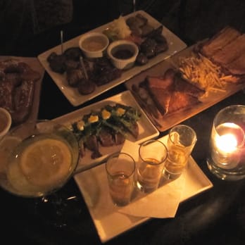 Watermark - smorgasbord of food: soft pretzel, charcuterie board, grilled cheeses, oyster shooters, ahi tuna with seaweed salad on top - Lounges Near Me - Asbury Park, New Jersey Watermark - smorgasbord of food: soft pretzel, charcuterie board, grilled cheeses, oyster shooters, ahi tuna with seaweed salad on top - Lounges Near Me - Asbury Park, New Jersey