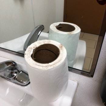 7-Eleven - a roll of toilet paper on a sink - Gas Stations Near Me - Pflugerville, Texas