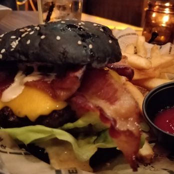 Copper Blues Rock Pub & Kitchen - Copper Blues famous black bun!! Just have one! - Bars Near Me - Doral, Florida Copper Blues Rock Pub & Kitchen - Copper Blues famous black bun!! Just have one! - Bars Near Me - Doral, Florida