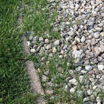 JNE LawnCare - Rock beds not being attended to - Landscaping Near Me JNE LawnCare - Rock beds not being attended to - Landscaping Near Me