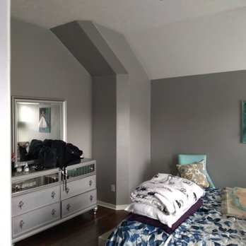Crdr Services - a bedroom with a bed and dresser - Home Cleaning Near Me