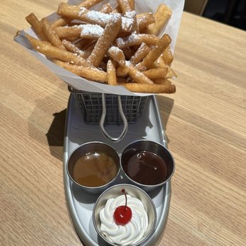 Dave & Buster's Thousand Oaks - Funnel Cake Fries with Chocolate, Caramel dipping sauce, whipped cream & cherry - Arcades Near Me - Thousand Oaks, California