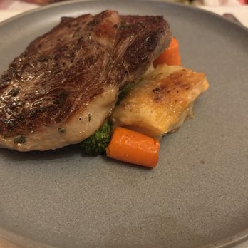 Il Cortile Ristorante - Ribeye Steak ($61) with potatoes and veggies. - Italian Near Me - Paso Robles, California Il Cortile Ristorante - Ribeye Steak ($61) with potatoes and veggies. - Italian Near Me - Paso Robles, California