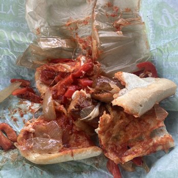 QuickChek - a half eaten sandwich on a paper plate - Gas Stations Near Me - Robbinsville, New Jersey