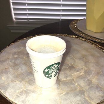 Starbucks - a cup of coffee on a table - Coffee & Tea Near Me - Fort Worth, Texas