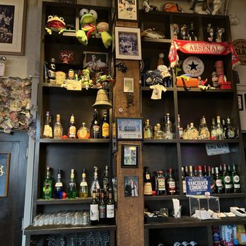 Black Frog Eatery - shelves of alcohol and liquor - Pubs Near Me - Vancouver, British Columbia Black Frog Eatery - shelves of alcohol and liquor - Pubs Near Me - Vancouver, British Columbia