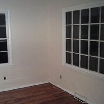 Qc Fix It - a empty room with two windows - General Contractors Near Me - Davenport, Iowa Qc Fix It - a empty room with two windows - General Contractors Near Me - Davenport, Iowa