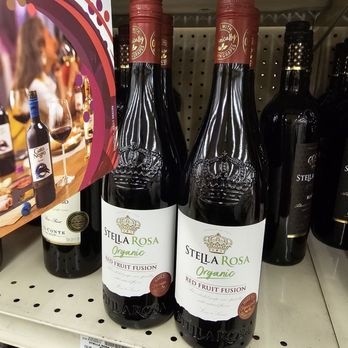 Albertsons - three bottles of wine on a shelf - Grocery Near Me - Apple Valley, California