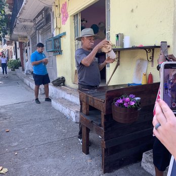 Vallarta Eats - The very skillful vendor who chopped coconuts for us. - Food Tours Near Me - Puerto Vallarta, JAL