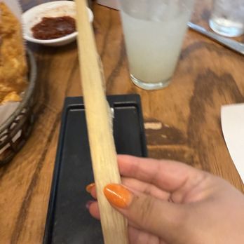 Canyon Cafe - Simon brought me this white chocolate almond stick in a cornhusk wrapper with my bill! It was tasty and a sweet gesture of the restaurant. - Tex-Mex Near Me - Saint Louis, Missouri