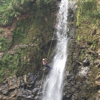 Rappel Maui - Posing in the middle of rappel B) - Tours Near Me - Haiku, Hawaii Rappel Maui - Posing in the middle of rappel B) - Tours Near Me - Haiku, Hawaii