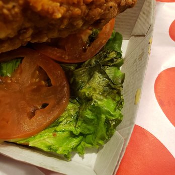 Chick-fil-A - ows a chicken sandwich with lettuce and tomatoes - Fast Food Near Me - Conroe, Texas Chick-fil-A - ows a chicken sandwich with lettuce and tomatoes - Fast Food Near Me - Conroe, Texas