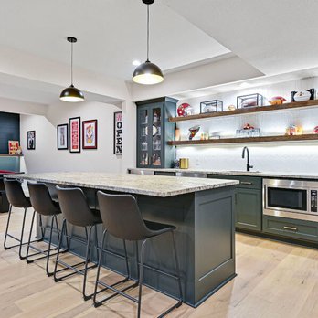 Built by Design - Transitional bar set up with lighted floating shelves, LVP flooring. - General Contractors Near Me - Overland Park, Kansas Built by Design - Transitional bar set up with lighted floating shelves, LVP flooring. - General Contractors Near Me - Overland Park, Kansas