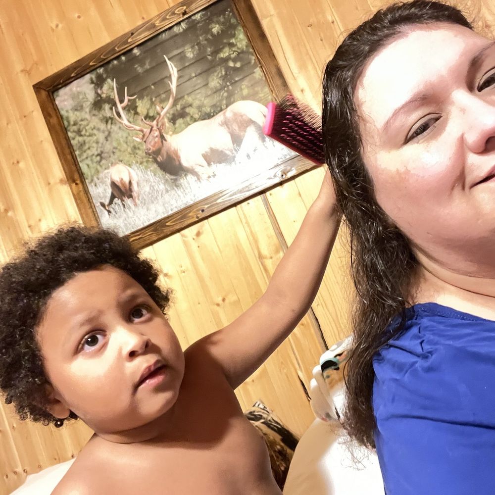 Hualapai Mountain Resort - My son brushing my hair while watching tv - Resorts Near Me - Kingman, Arizona