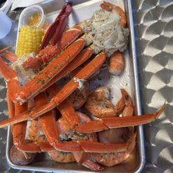 TJE Seafood - Snow Crab & Shrimp Boil served with red potatoes and corn