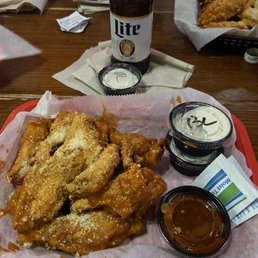 12 Pieces Dirty Bird Wings with a side of Ouch!